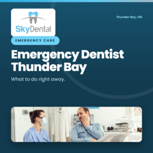 Man holding his cheek in pain while a masked dental assistant looks on, SkyDental Emergency Care blog cover: Emergency Dentist Thunder Bay – what to do right away.