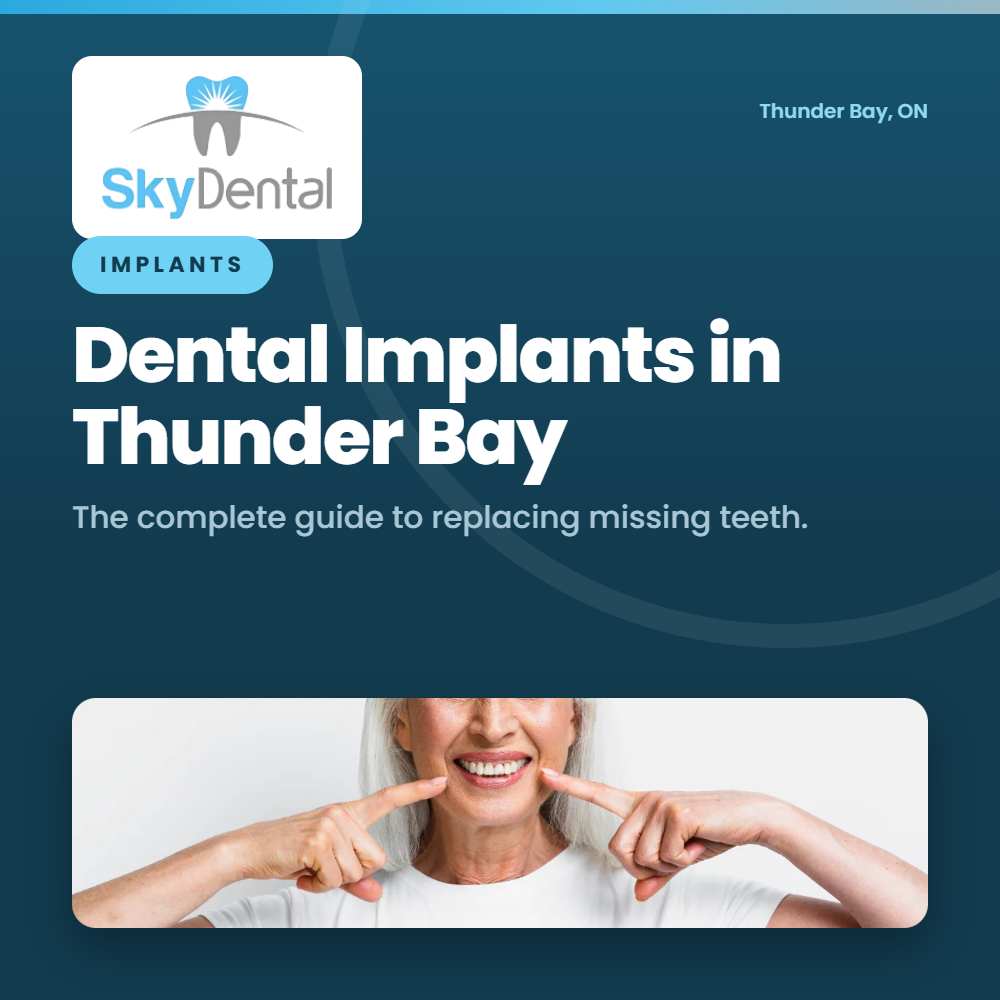 Older woman pointing to her smile with both index fingers, SkyDental Implants blog cover: Dental Implants in Thunder Bay – the complete guide to replacing missing teeth.