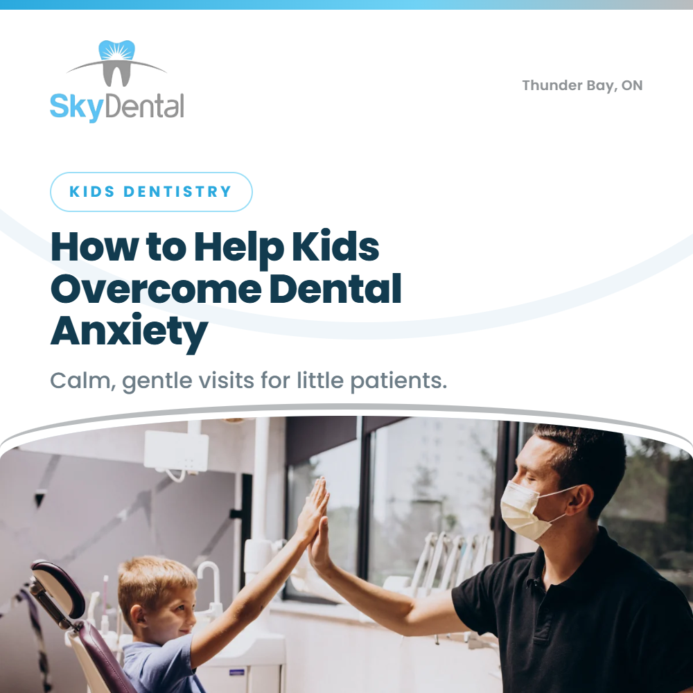 Dentist giving a high-five to a young boy in dental chair - how to help kids overcome dental anxiety, Sky Dental Thunder Bay