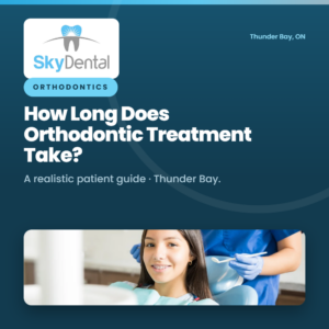 Smiling teenage girl with braces in a dental chair beside a gloved orthodontist, SkyDental Orthodontics blog cover: How Long Does Orthodontic Treatment Take in Thunder Bay? – a realistic patient guide.