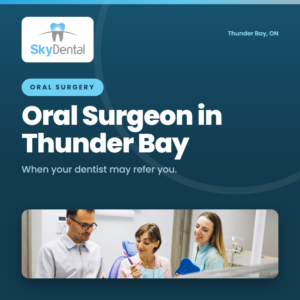 Dental team reviewing a mouth guard together in clinic - when your dentist may refer you to an oral surgeon in Thunder Bay, Sky Dental