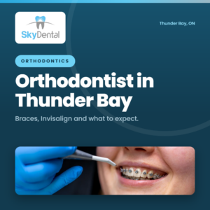 Close-up of smiling patient with braces getting a dental checkup - braces, Invisalign, and what to expect at Sky Dental Centre in Thunder Bay