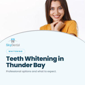 Smiling woman in a yellow shirt resting her chin on her hands, SkyDental Whitening blog cover: Teeth Whitening in Thunder Bay – professional options and what to expect.