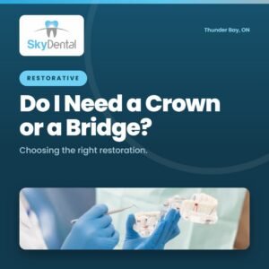 dentist holding a dental bridge